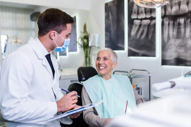 Beautiful,Senior,Woman,At,Dentist's,Office,Satisfied,After,Successful,Dental