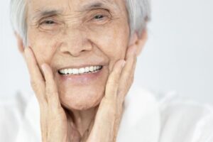 an aging woman with a beaming smile